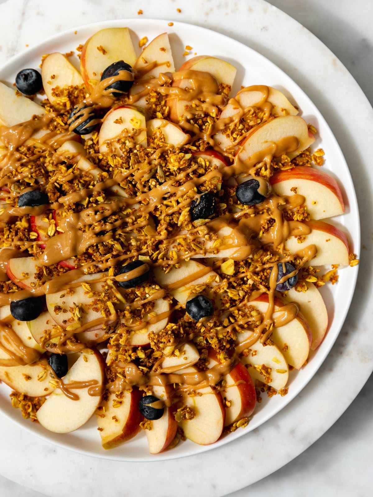 healthy vegan breakfast with fruit granola nuts and plant based ingredients