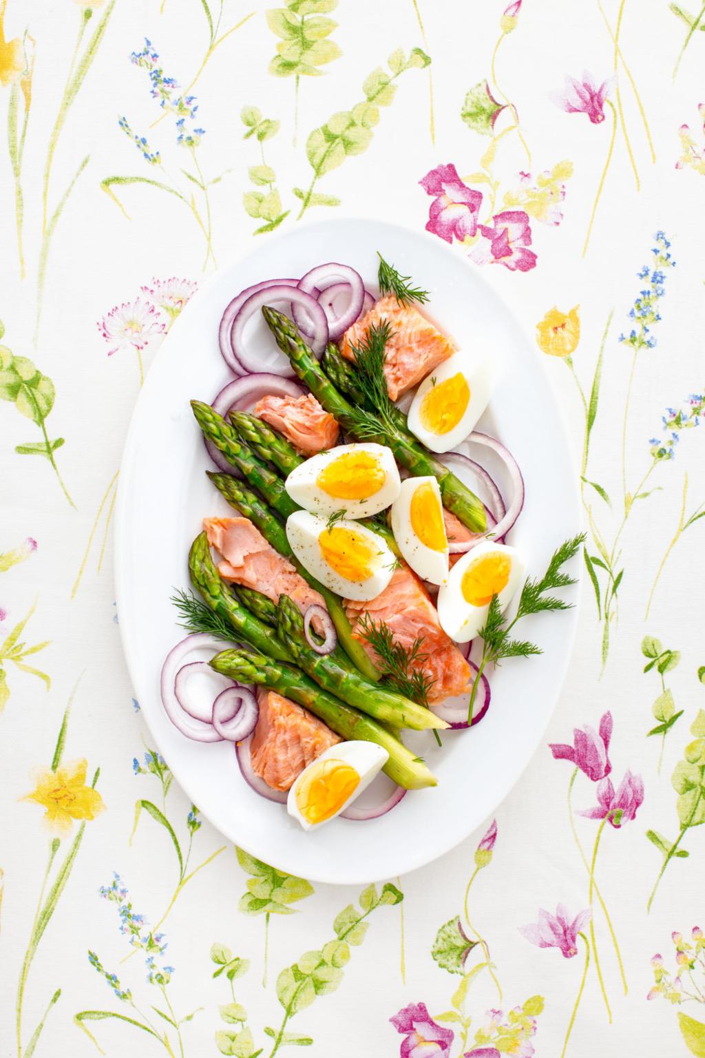 protein rich meal with salmon boiled eggs asparagus and healthy diet foods